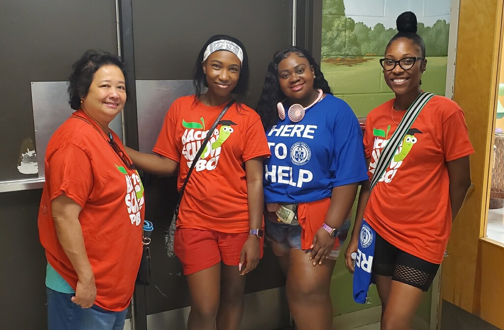 Clerk volunteers at Back to School PBC